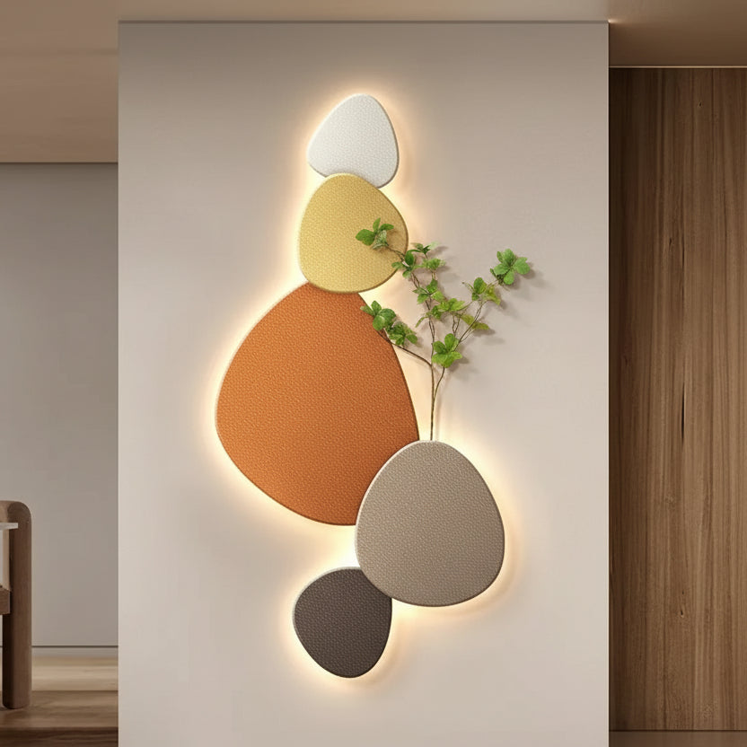 Modern wall art with geometric shapes and lighting in a room setting